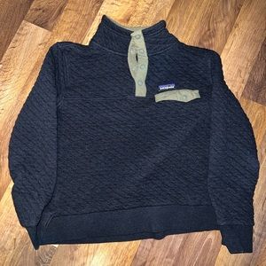 Women’s medium quilted snap T. Only used once.